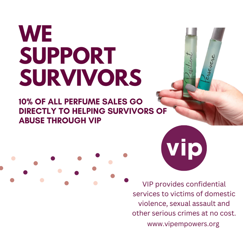 Advertisement for perfume with text about supporting survivors of abuse and a hand holding two perfume bottles.